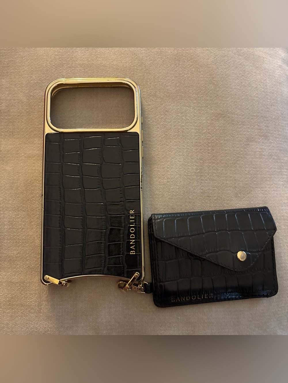 Bandolier Black Magsafe Phone Case and Remi Wallet. 17 ProMax